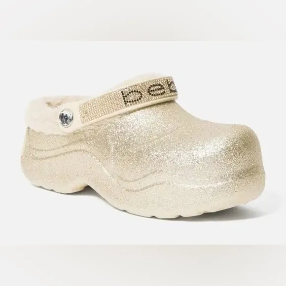 Bebe Bling Gold Glitter Fur Lined Platform Clogs