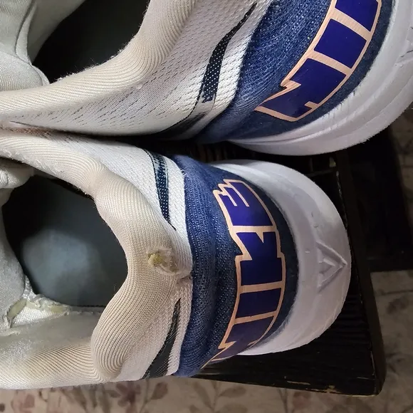 Nike White and Blue Sneakers with Colorful Sole