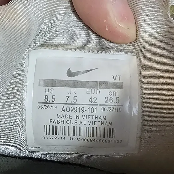 Nike White and Blue Sneakers with Colorful Sole